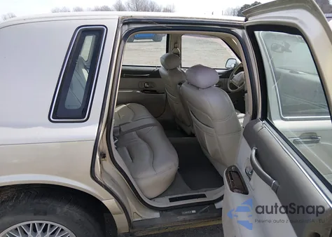 1997 Lincoln Town Car Signature из США, поврежденный, VIN 1LNLM82W9VY739692